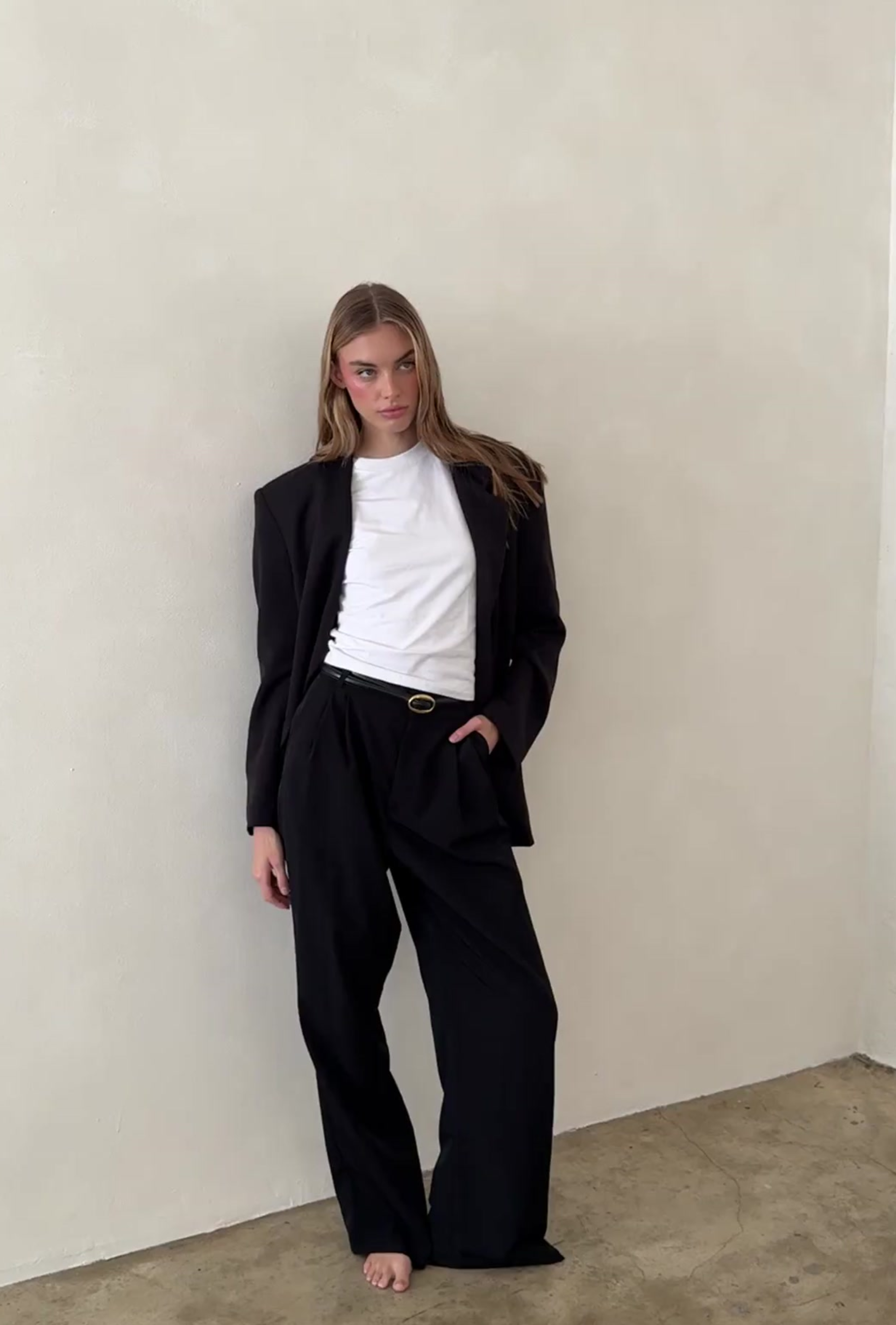 Black boxy blazer and tailored trouser worn with a white crewneck tee