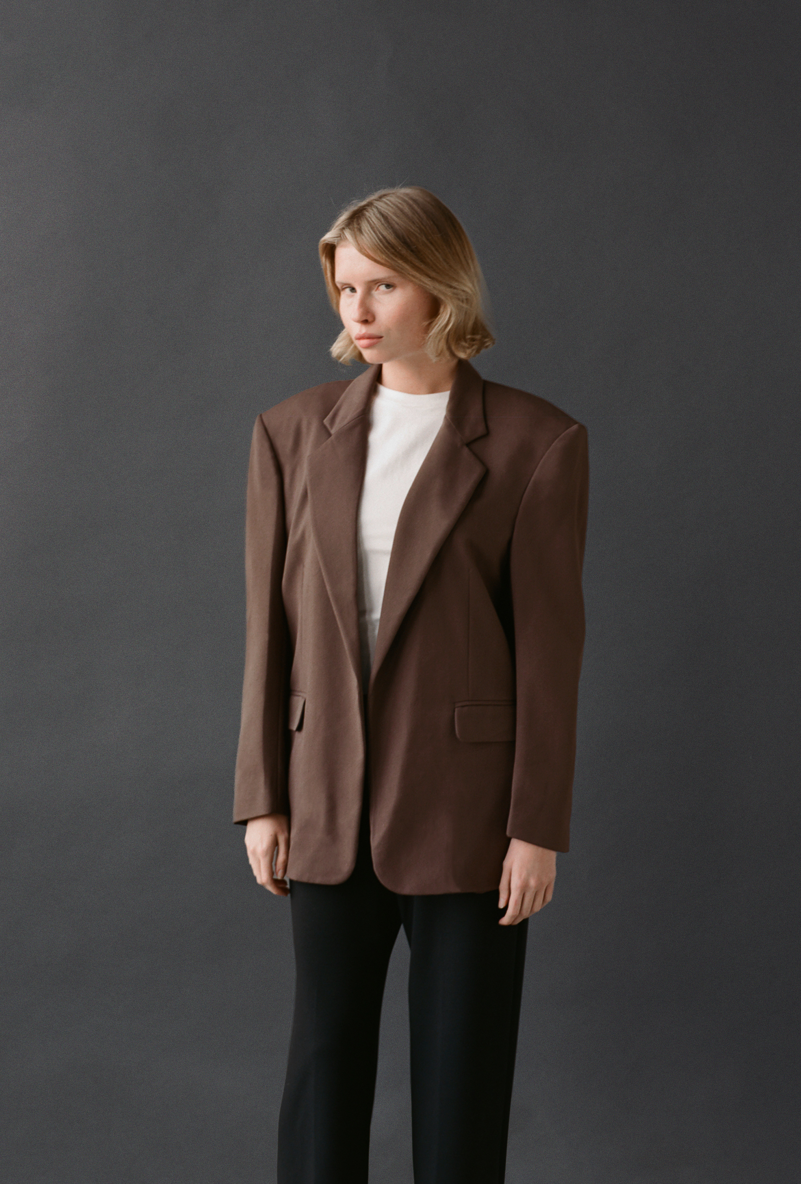 LAUD blazer in brown styled with the white tee and black pants
