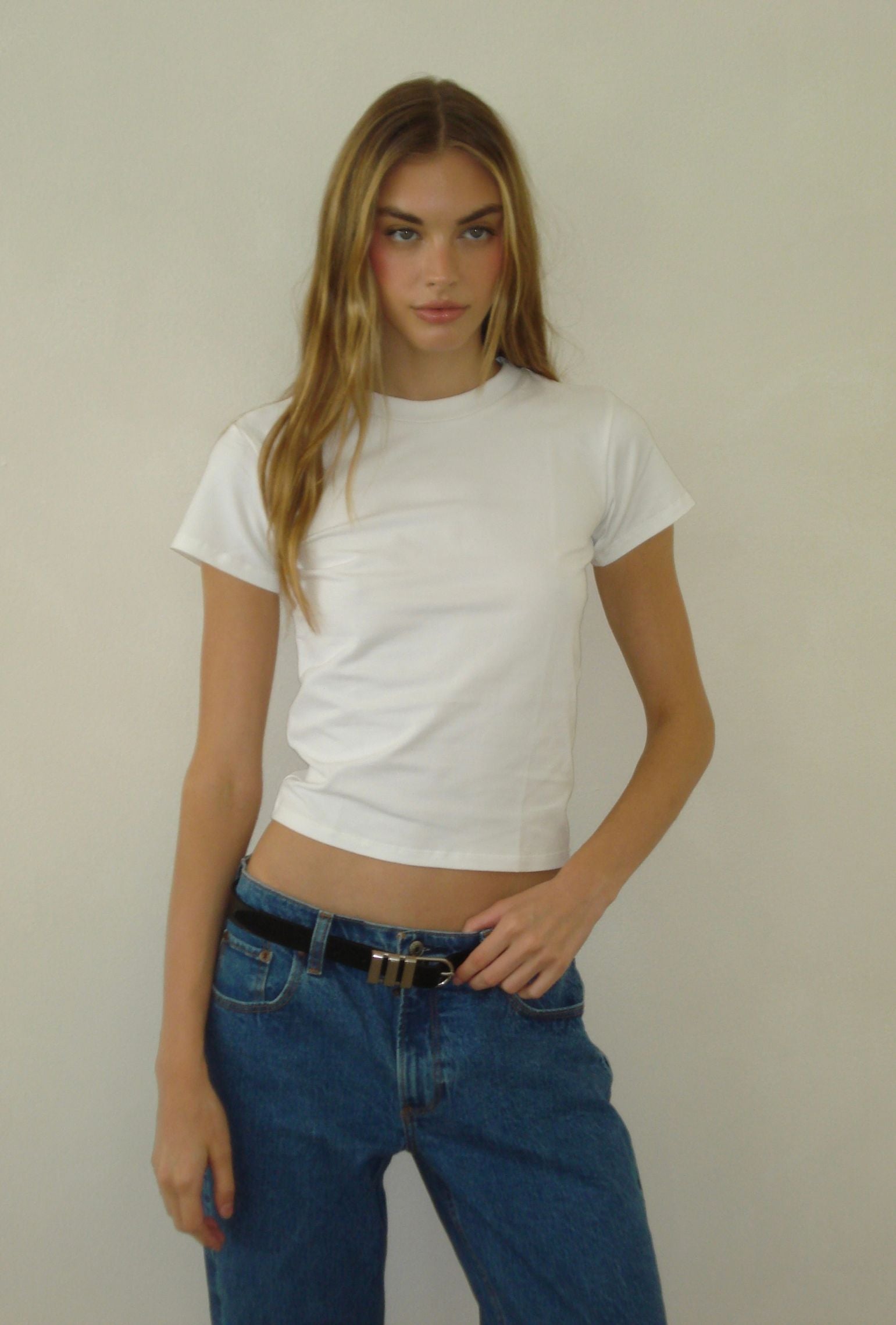 White crew neck tee styled with blue denim