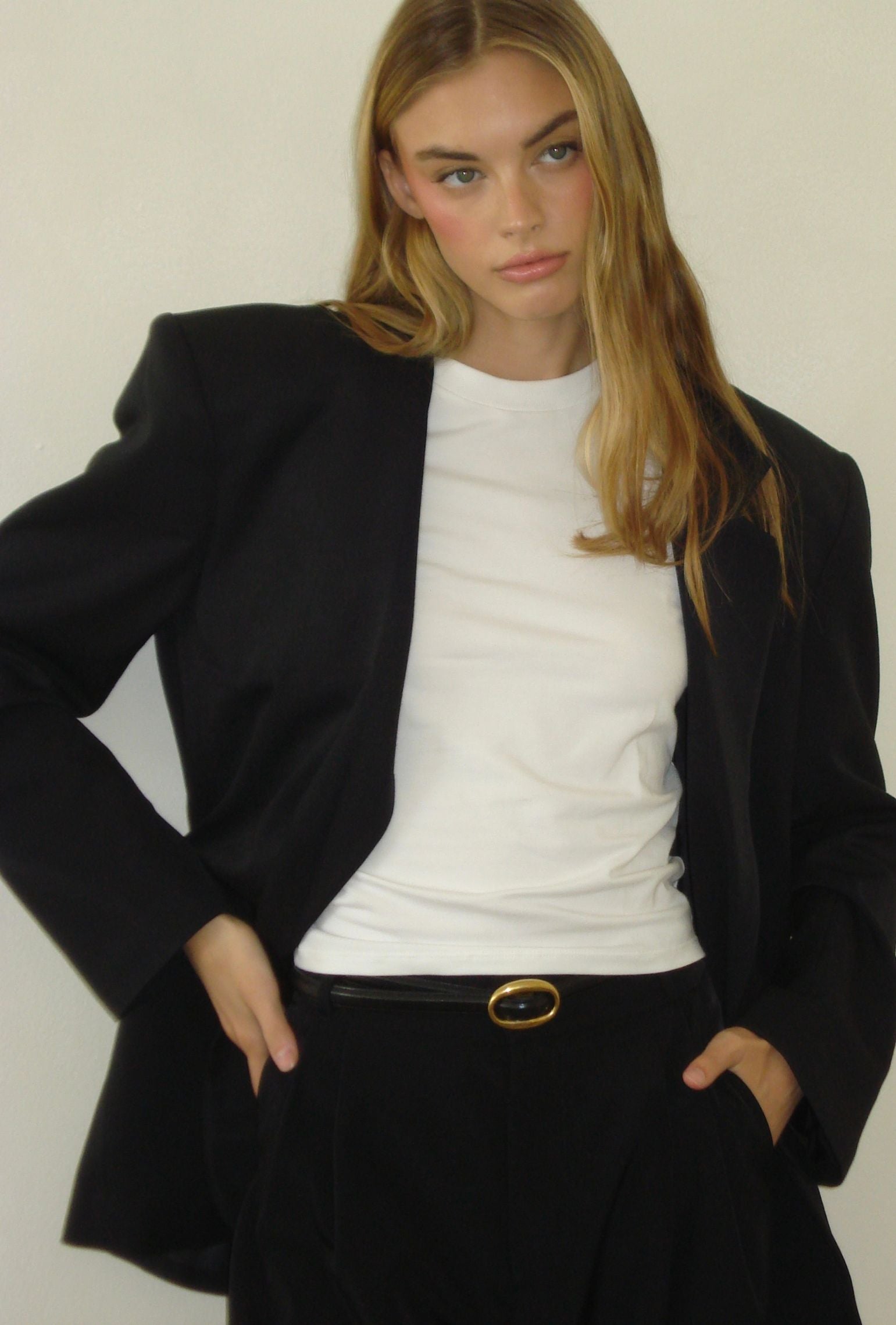 Black oversized blazer styled with a white crew neck tee