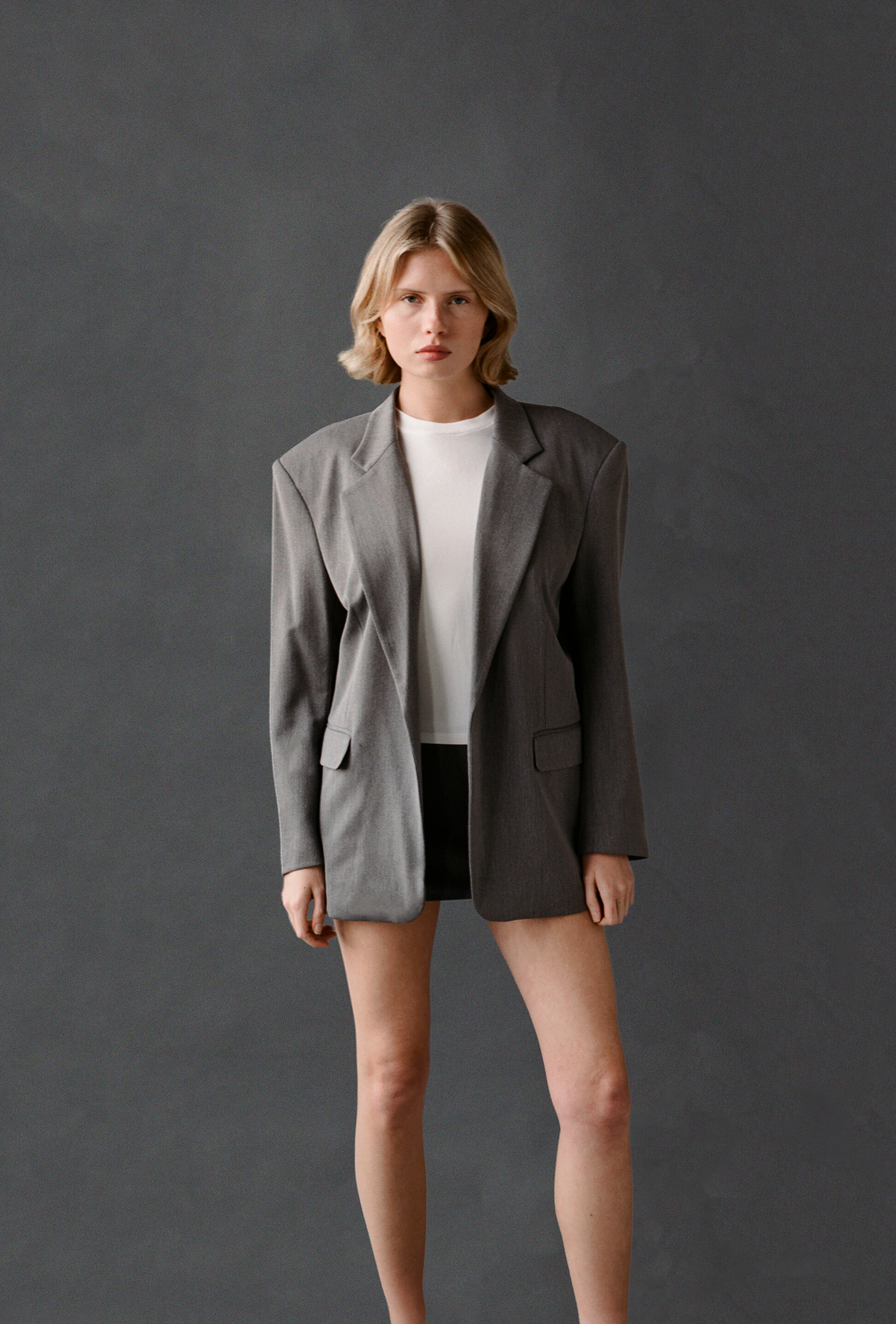 LAUD blazer in gray styled with the white tee and mini skirt