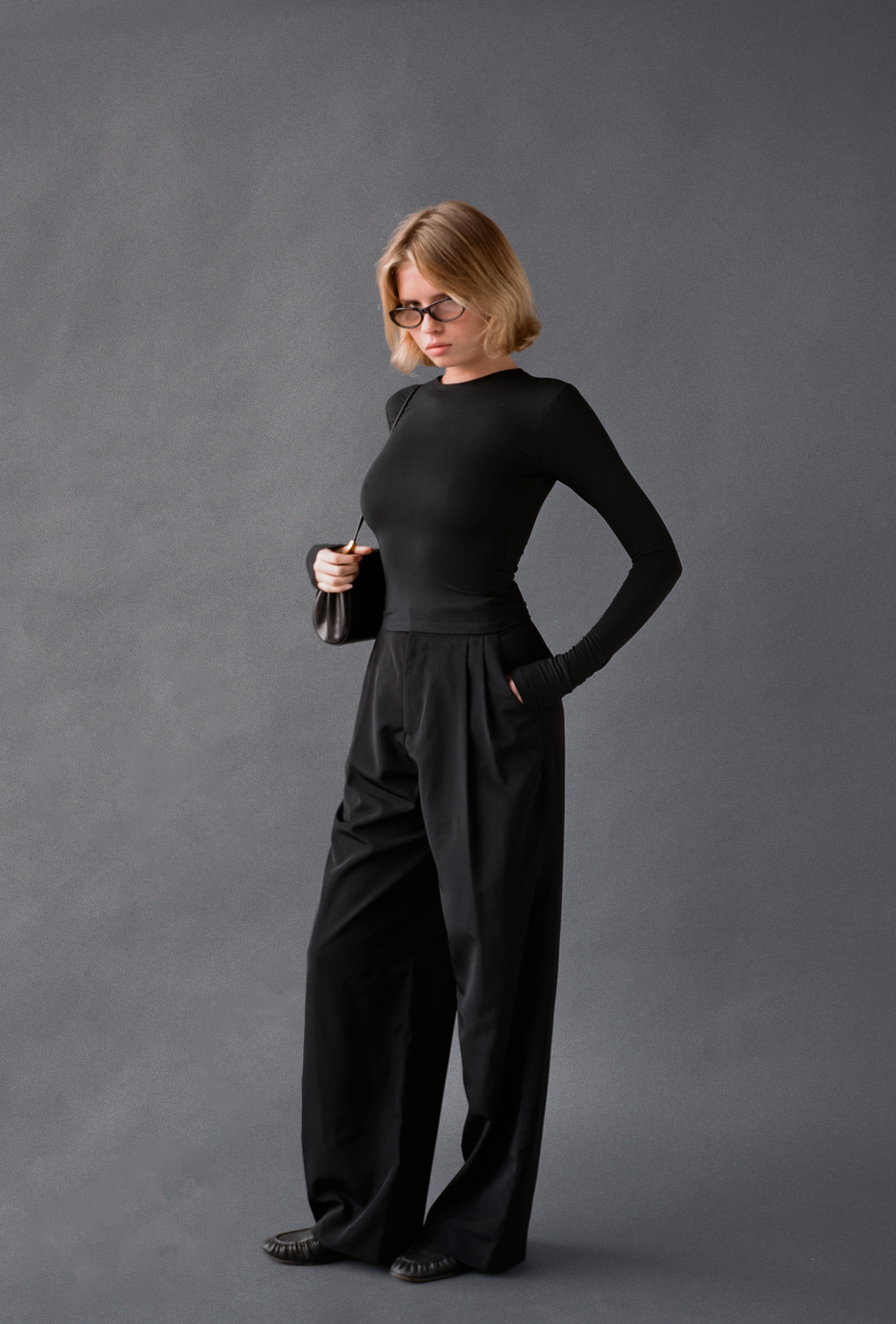 LAUD long sleeve tee in black styled with black trousers and shoulder bag