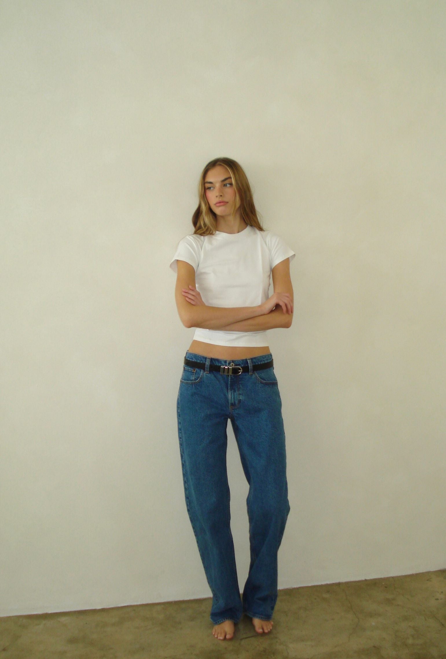 White crew neck tee styled with denim